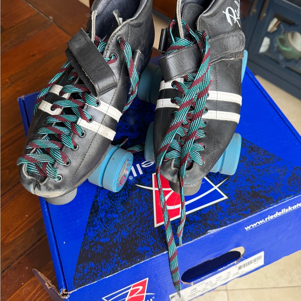 Black Roller Skates with Blue Wheels